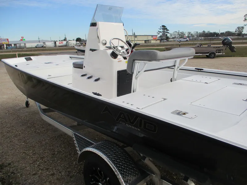 Slide: The Image of 2025 Avid 20 ROGUE CC boat with sleek design and spacious deck. - 9