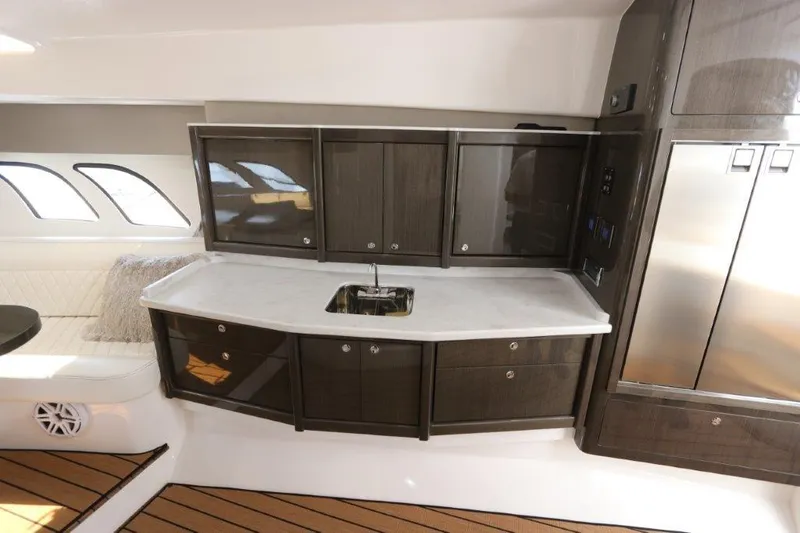 Slide: The Image of Luxurious interior of 2019 Intrepid 475 Sport Yacht with sleek cabinetry and modern design. - 44