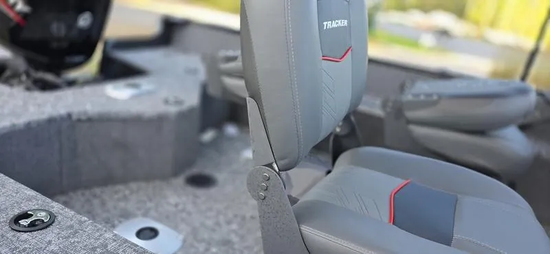 Slide: The Image of 2025 Tracker PG V16 WT boat interior with gray seating and modern design. - 9