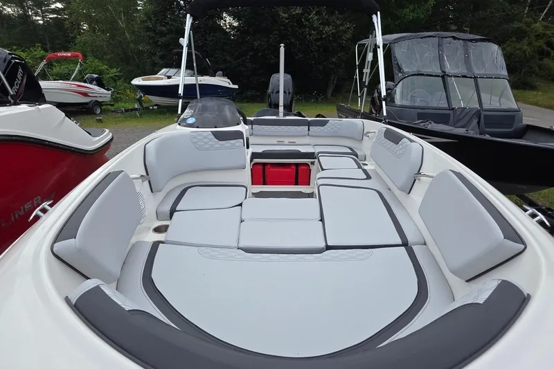 Slide: The Image of 2025 Bayliner M15 boat interior with spacious seating and modern design. - 17