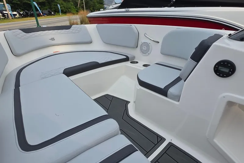Slide: The Image of Interior of 2025 Bayliner M15 boat with modern seating and sleek design. - 3
