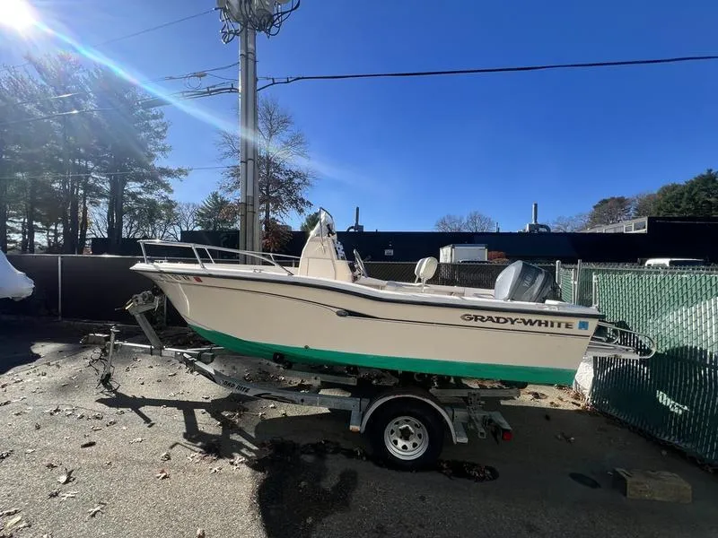 Slide: The Image of 1998 Grady-White 180 Sportsman boat on trailer in outdoor setting. - 3