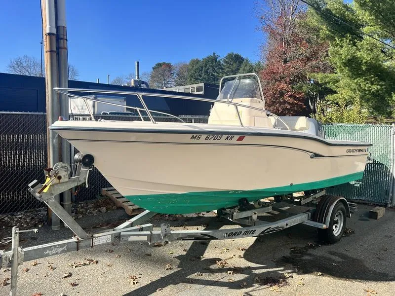 Slide: The Image of 1998 Grady-White 180 Sportsman boat on trailer, parked outdoors. - 5