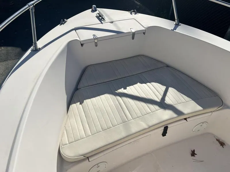 Slide: The Image of 1998 Grady-White 180 Sportsman boat interior with cushioned seating. - 7