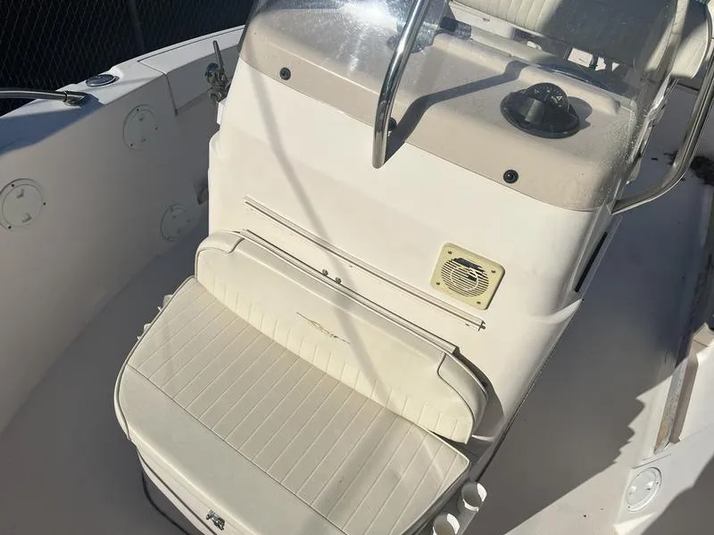 Slide: The Image of 1998 Grady-White 180 Sportsman boat interior with seating and console. - 9