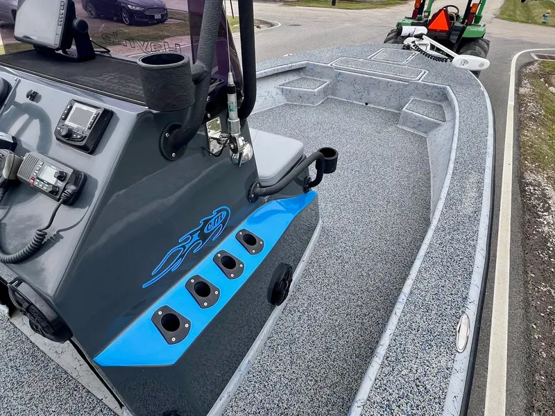 Slide: The Image of 2021 Haynie 25 Magnum boat with sleek design and spacious deck. - 13