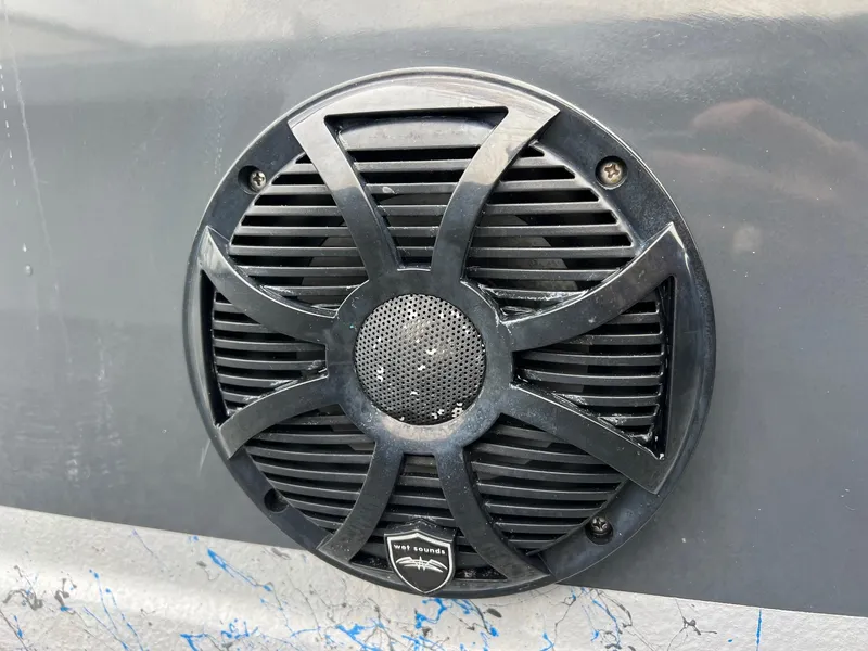 Slide: The Image of Close-up of a black speaker on a 2021 Haynie 25 Magnum boat. - 18