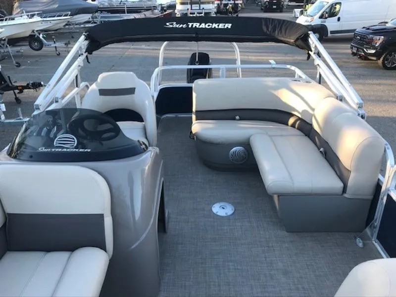 Slide: The Image of 2022 Sun Tracker PB 18 DLX pontoon boat with spacious seating and modern design. - 15
