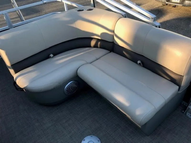 Slide: The Image of 2022 Sun Tracker PB 18 DLX pontoon boat seating, beige and gray upholstery. - 16