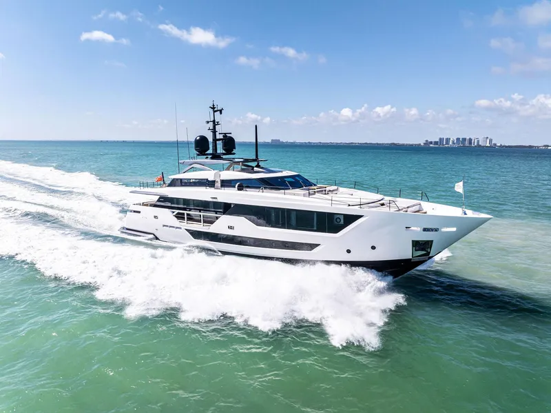 Slide: The Image of Luxury yacht Custom Line 106 cruising on open sea, 2022 model. - 18