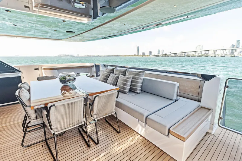 Slide: The Image of Luxurious 2022 Custom Line 106 yacht deck with seating and ocean view. - 33
