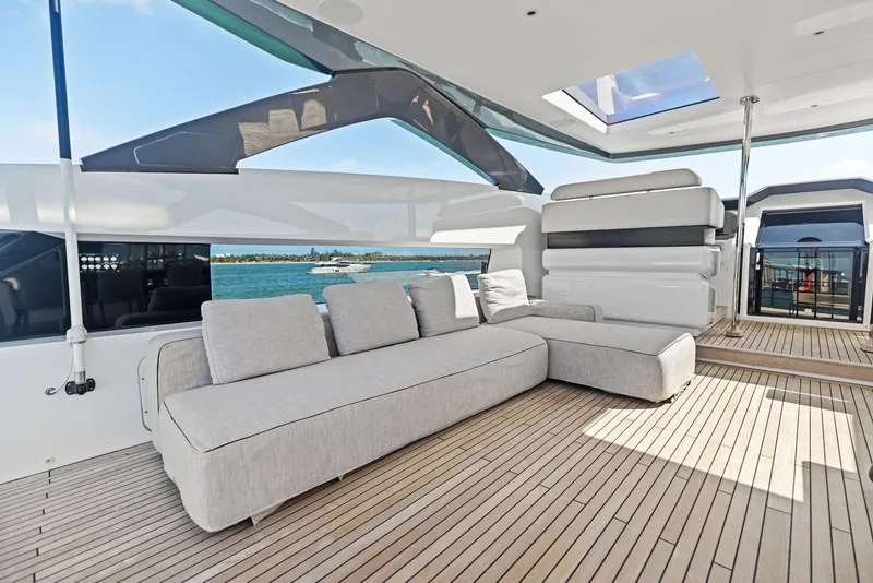 Slide: The Image of Luxurious Custom Line 106 yacht deck with modern seating, 2022 model. - 39