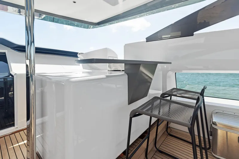 Slide: The Image of Modern yacht interior with sleek bar and seating, Custom Line 106, 2022 model. - 43