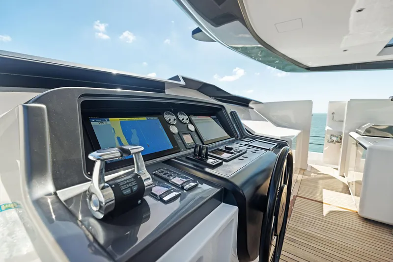 Slide: The Image of Luxury yacht helm with modern navigation system, Custom Line 106, 2022 model, ocean view. - 46
