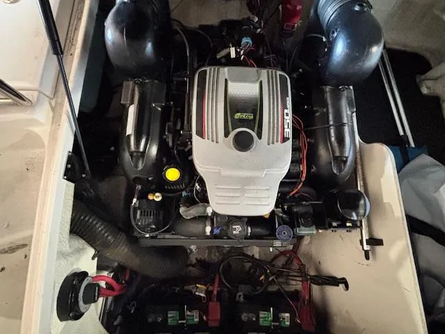 Slide: The Image of Engine compartment of a 2013 Sea Ray 220 Sundeck boat. - 10