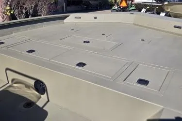 Slide: The Image of 2025 Tracker Grizzly 2072 CC boat deck with storage compartments. - 4