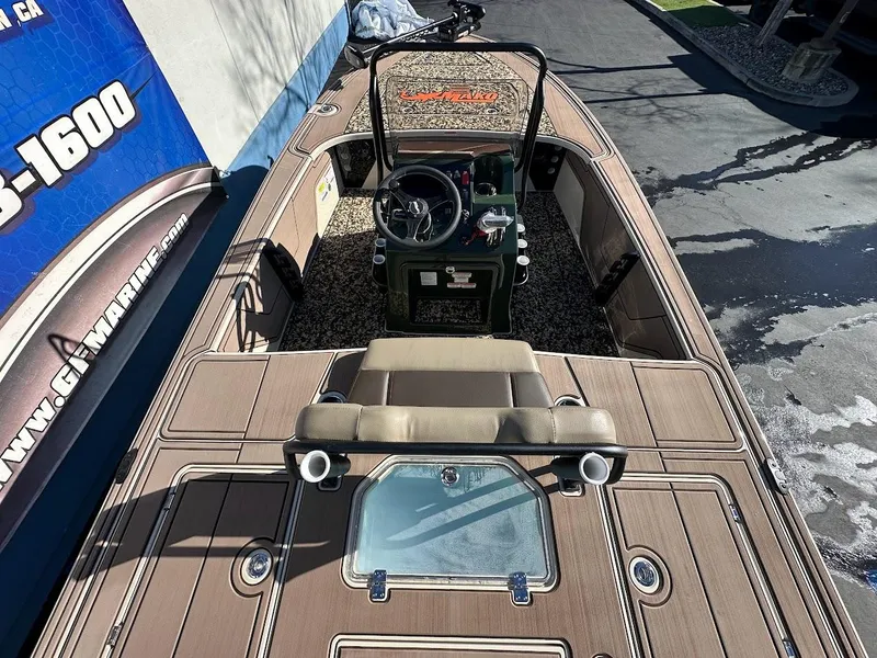 Slide: The Image of 2025 Mako 18 Pro Skiff Backwater Edition boat with sleek design and modern features. - 11