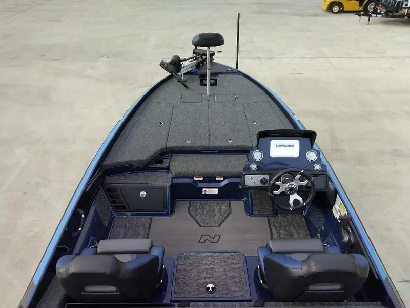 Slide: The Image of 2025 Nitro Z21 XL boat interior with steering console and seating. - 4