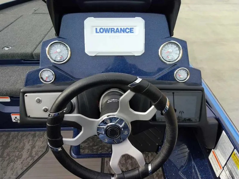 Slide: The Image of Steering console of 2025 Nitro Z21 XL boat with Lowrance display and gauges. - 6