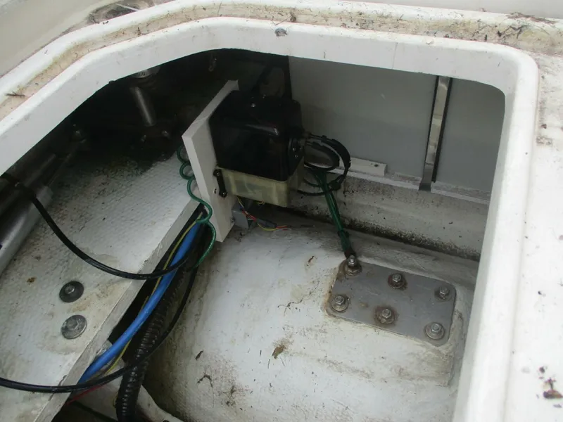 Slide: The Image of Engine compartment of 2007 Silverton 33 Convertible boat, showing wiring and components. - 19