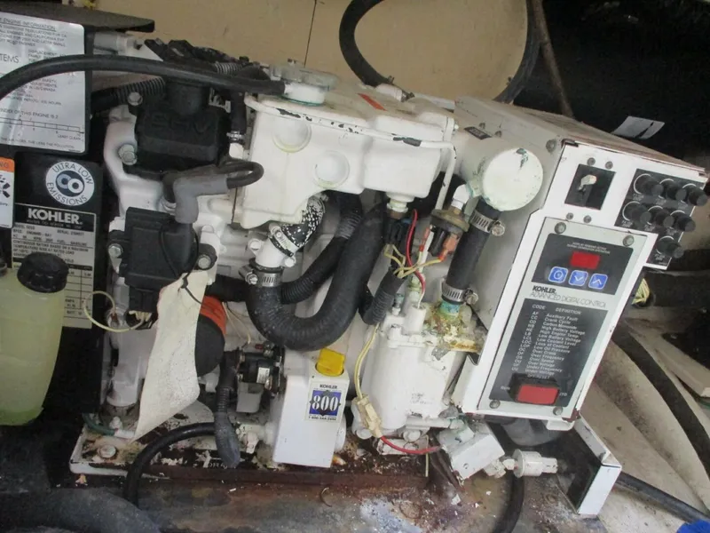 Slide: The Image of Kohler marine generator in a 2007 Silverton 33 Convertible boat. - 23