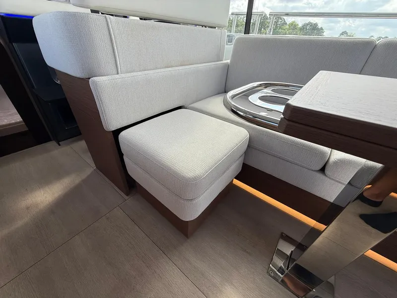 Slide: The Image of Luxurious seating area on 2025 Wellcraft 44 Explorer yacht with modern design and elegant finishes. - 36