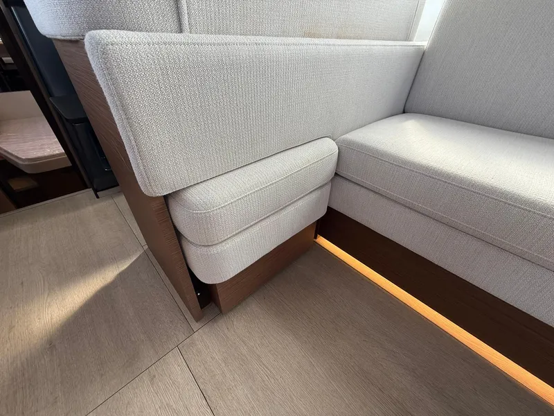 Slide: The Image of Interior seating of 2025 Wellcraft 44 Explorer, featuring modern design and neutral upholstery. - 37