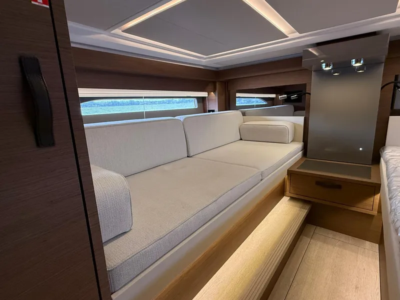 Slide: The Image of Luxurious interior of 2025 Wellcraft 44 Explorer yacht with modern seating and ambient lighting. - 42