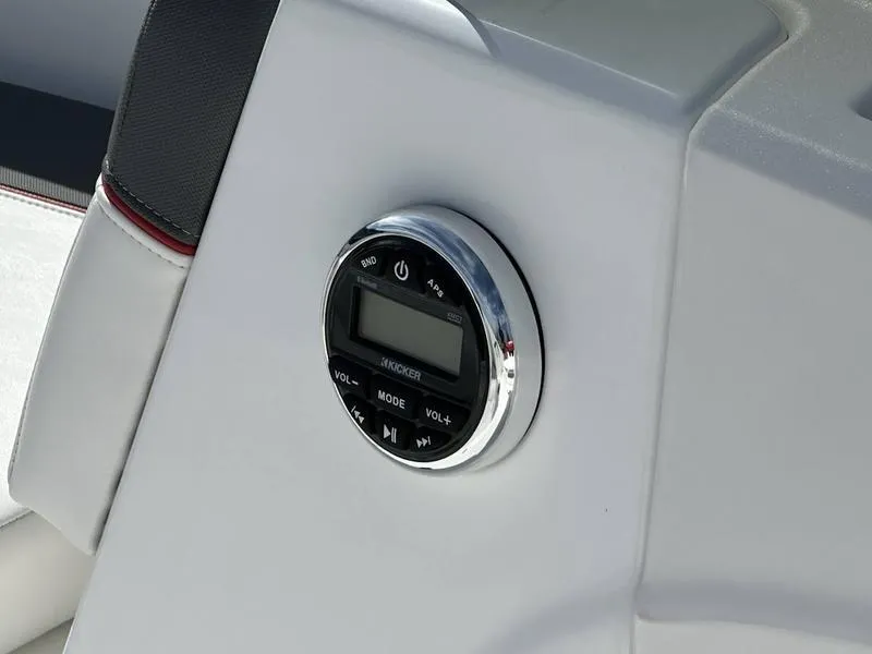 Slide: The Image of 2025 Tahoe T18 boat stereo system with control panel and digital display. - 9