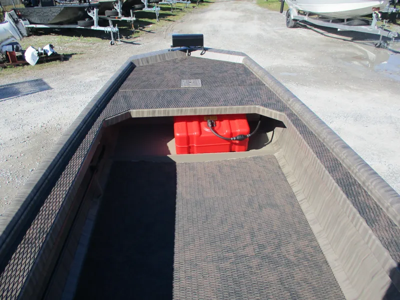 Slide: The Image of 2025 Gator Tail 1854 Extreme boat interior with red fuel tank, parked on gravel. - 4
