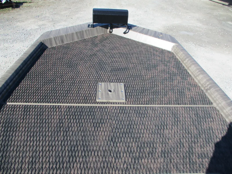 Slide: The Image of Gator Tail 1854 Extreme 2025 boat deck with textured surface. - 5