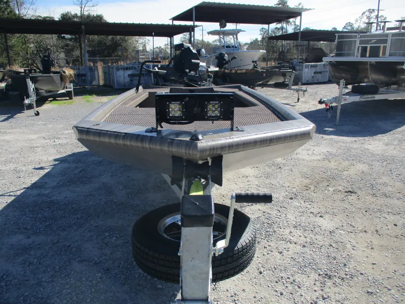 Slide: The Image of 2025 Gator Tail 1854 Extreme boat on trailer in outdoor lot. - 6
