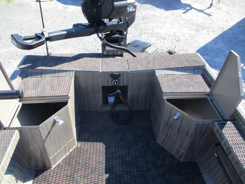 Slide: The Image of 2025 Gator Tail 1854 Extreme boat interior with storage compartments and motor. - 9