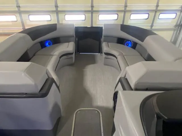 Slide: The Image of 2025 South Bay 500 interior with modern seating and blue LED lighting. - 4