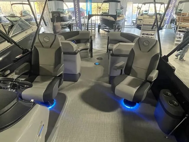 Slide: The Image of 2025 South Bay 500 boat interior with modern seating and ambient lighting. - 7
