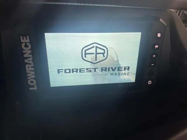 Slide: The Image of Lowrance display screen on 2025 South Bay 500 boat, showing Forest River Marine logo. - 9