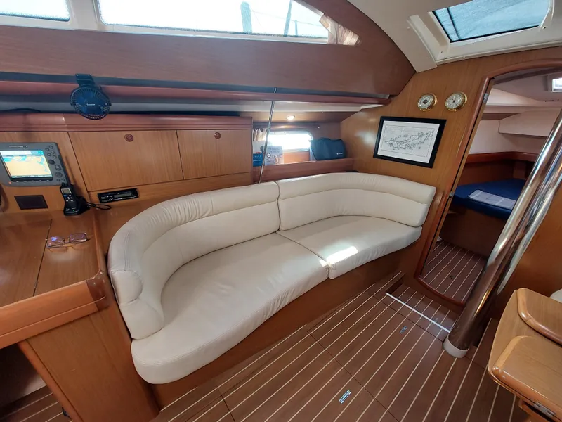 Slide: The Image of Interior of 2006 Jeanneau Sun Odyssey 42 DS sailboat with cream leather seating. - 17