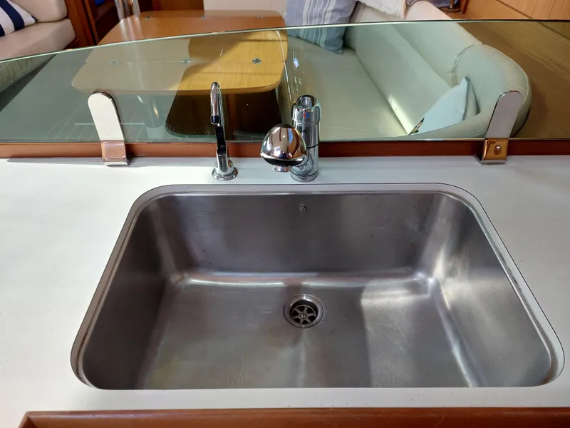 Slide: The Image of Stainless steel sink in 2006 Jeanneau Sun Odyssey 42 DS yacht interior. - 27