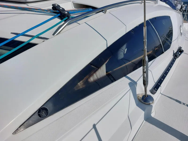 Slide: The Image of Close-up of 2006 Jeanneau Sun Odyssey 42 DS yacht deck and window. - 41