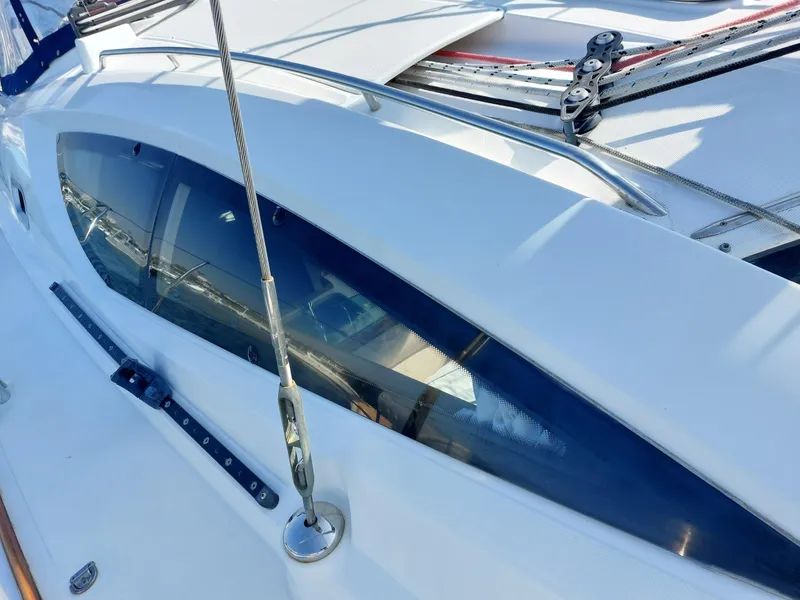 Slide: The Image of 2006 Jeanneau Sun Odyssey 42 DS sailboat deck with sleek design and rigging details. - 42