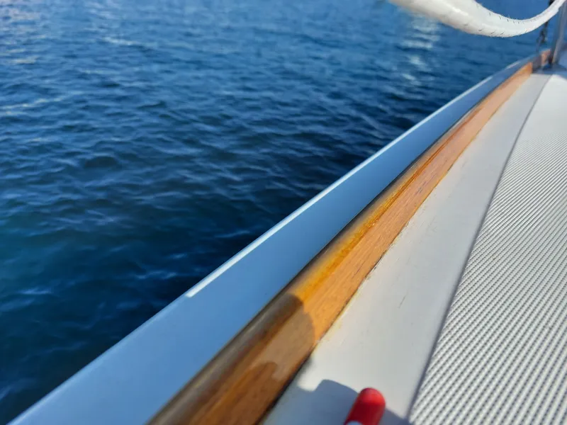 Slide: The Image of Close-up of Jeanneau Sun Odyssey 42 DS deck, 2006 model, with ocean view. - 44