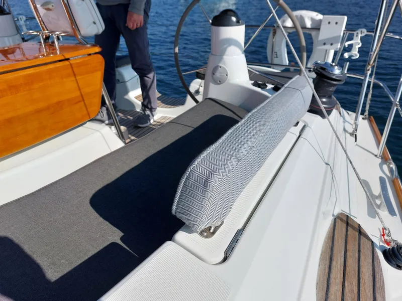 Slide: The Image of Cockpit of 2006 Jeanneau Sun Odyssey 42 DS sailboat with seating and steering wheel. - 48