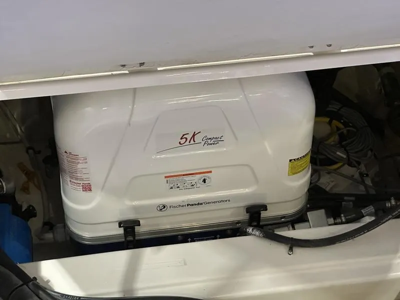 Slide: The Image of Fischer Panda generator in 2025 Cutwater C-32 CB LE boat engine compartment. - 13