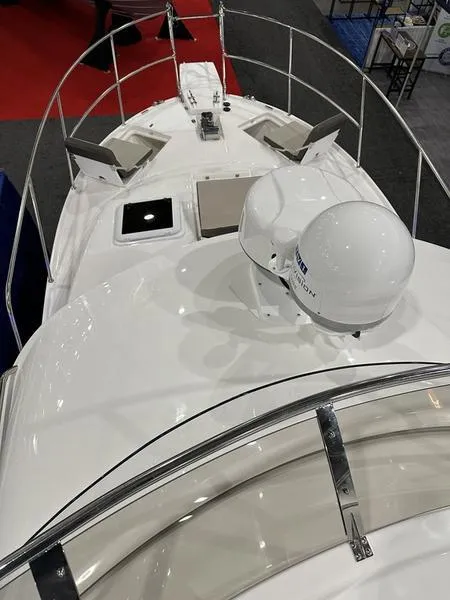Slide: The Image of 2025 Cutwater C-32 CB LE boat deck with radar and seating area. - 16