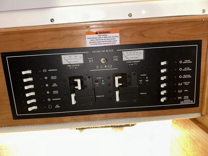 Slide: The Image of Electrical control panel on 2025 Cutwater C-32 CB LE boat. - 27
