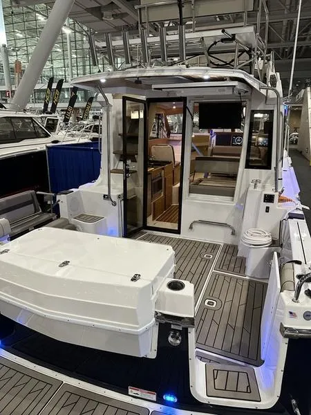 Slide: The Image of 2025 Cutwater C-32 CB LE boat interior, showcasing modern design and spacious layout. - 9