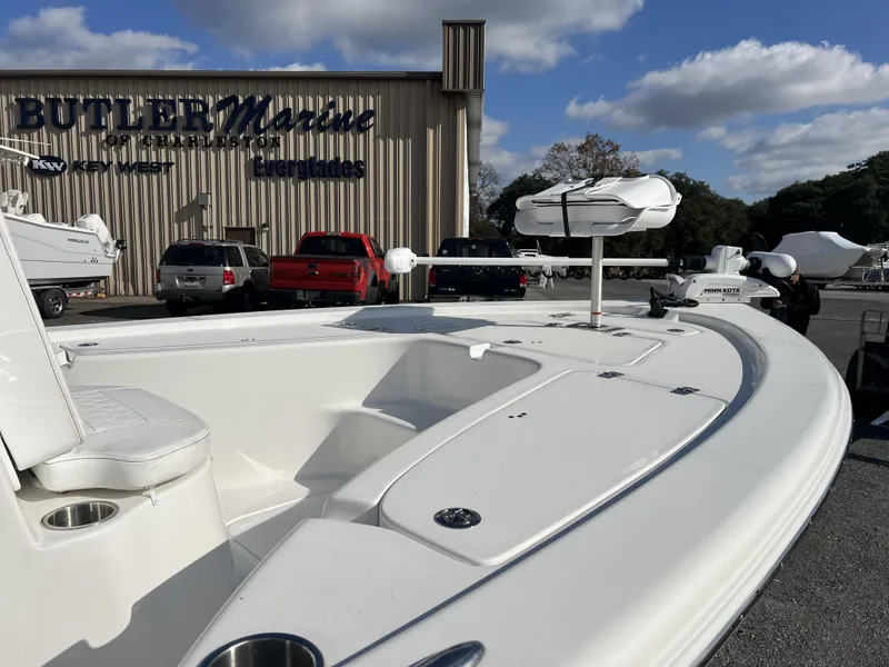 Slide: The Image of 2023 Sea Pro 208 Bay boat at Butler Marine dealership, clear sky background. - 3
