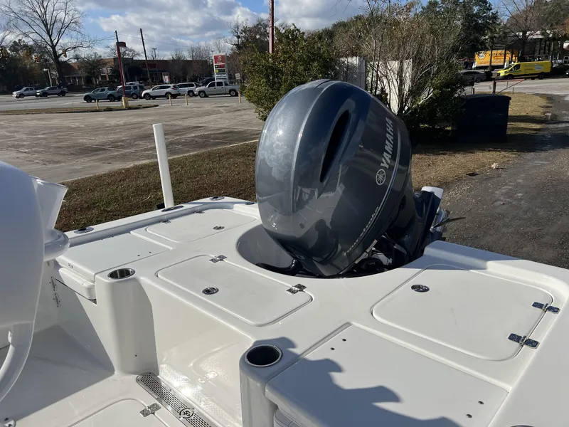 Slide: The Image of 2023 Sea Pro 208 Bay boat with Yamaha outboard motor in a parking lot. - 8