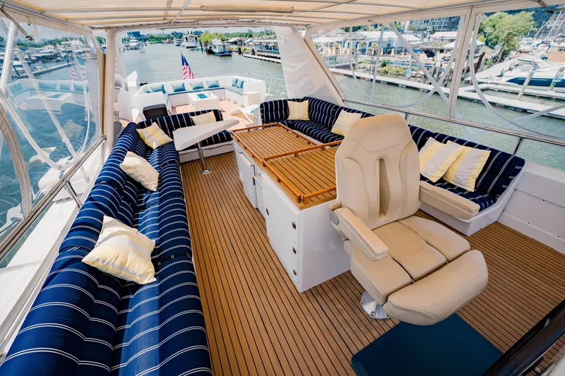 Slide: The Image of Luxurious 1987 Guy Couach 97 yacht interior with plush seating and elegant design. - 19