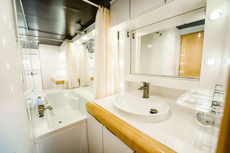 Slide: The Image of Luxurious bathroom in 1987 Guy Couach 97 yacht with modern fixtures and elegant design. - 38